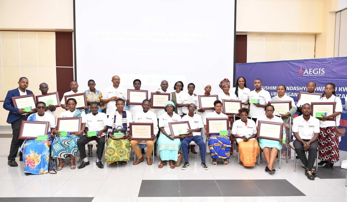 Gender champions who excelled in progress of promoting positive masculinities and fostering gender equality posing for a group photo after the rewarding ceremony in Kigali
