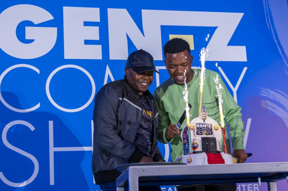 Minister Utumatwishima joins Merci Ndaruhutse, the brain behind Genz Comedy Show to cut a cake to celebrate the achievements of the show on Thursday,March 21. Mugwiza