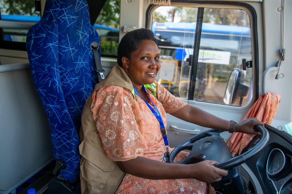 Ernestine Mukagihana drives a six-wheel 70-seater RITCO Bus, ferrying passengers from Kigali to upcountry destinations. Photo by Willy Mucyo