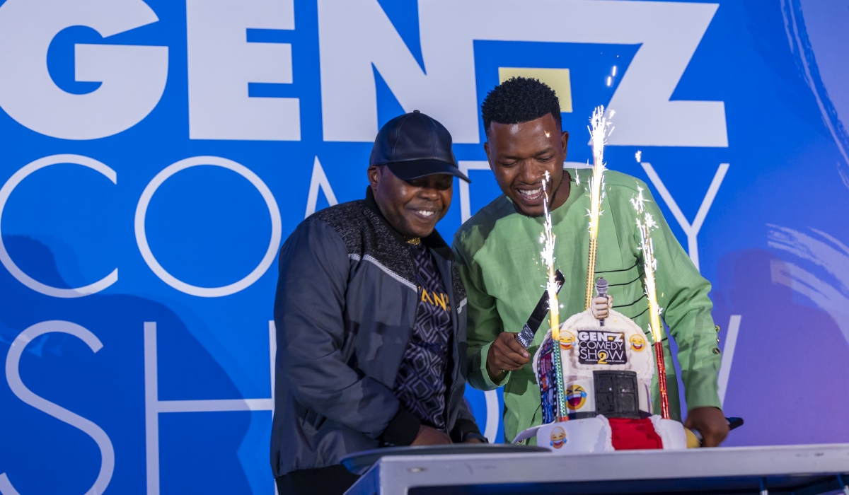 Minister Utumatwishima joins Merci Ndaruhutse, the brain behind Genz Comedy Show to cut a cake to celebrate the achievements of the show on Thursday,March 21. Mugwiza