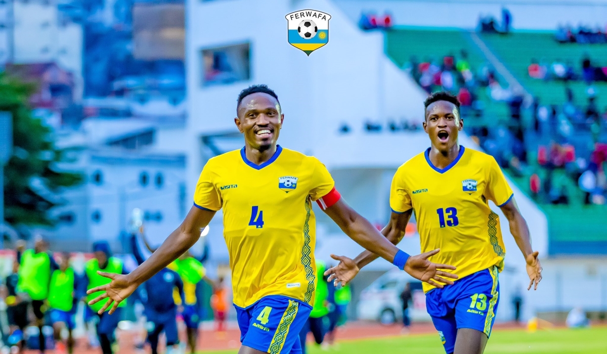 Goal scorer Amavubi Captain Djihad Bizimana nad Fitina Ombolenga celebrate the second goal as Rwanda beat Madagascar 2-0 in Antananarivo on Monday, March 25. (2)
