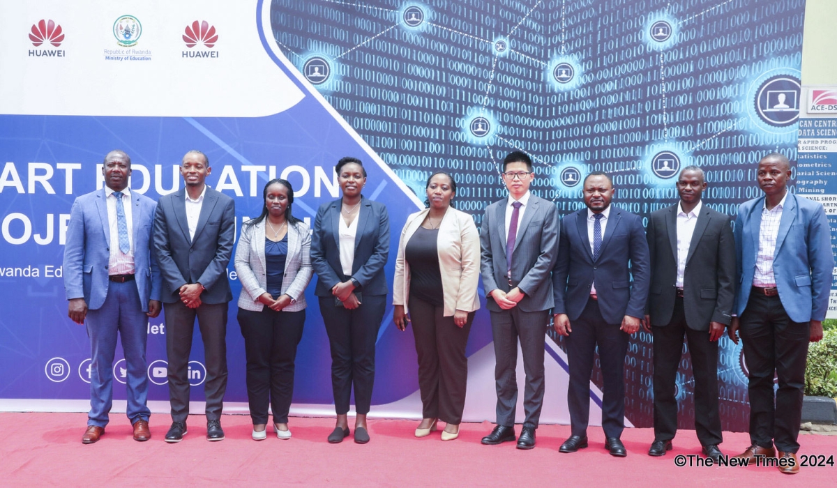 Officials pose for a group photo during the inauguration of  the Rwanda Smart Education Network on Tuesday, March 26. Photo by Craish Bahizi