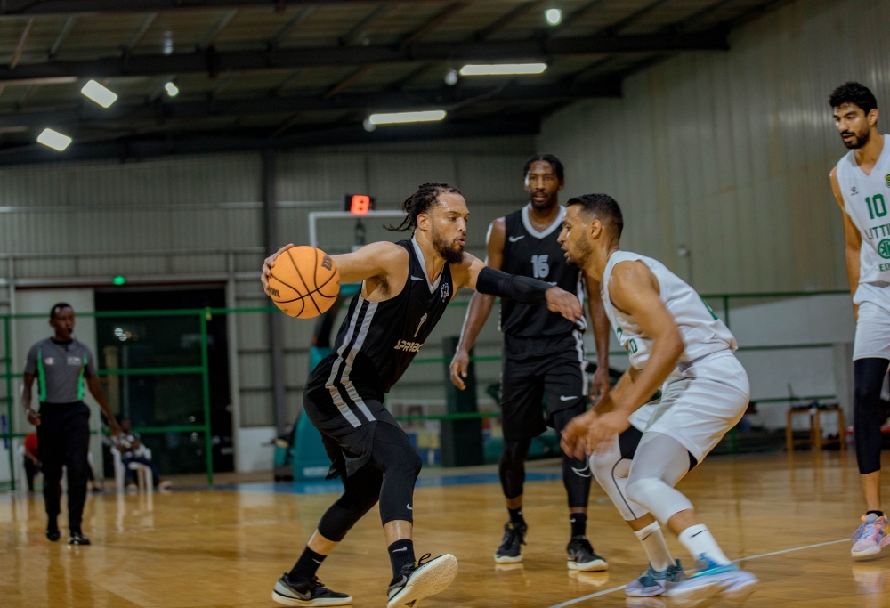 Dixon tries to dribble past an Al Ittihad Alexandria opponent during a past friendly game. The two will become teammates after the American completed his move to the Egyptian side earleir this week-Dan Gatsinzi 
