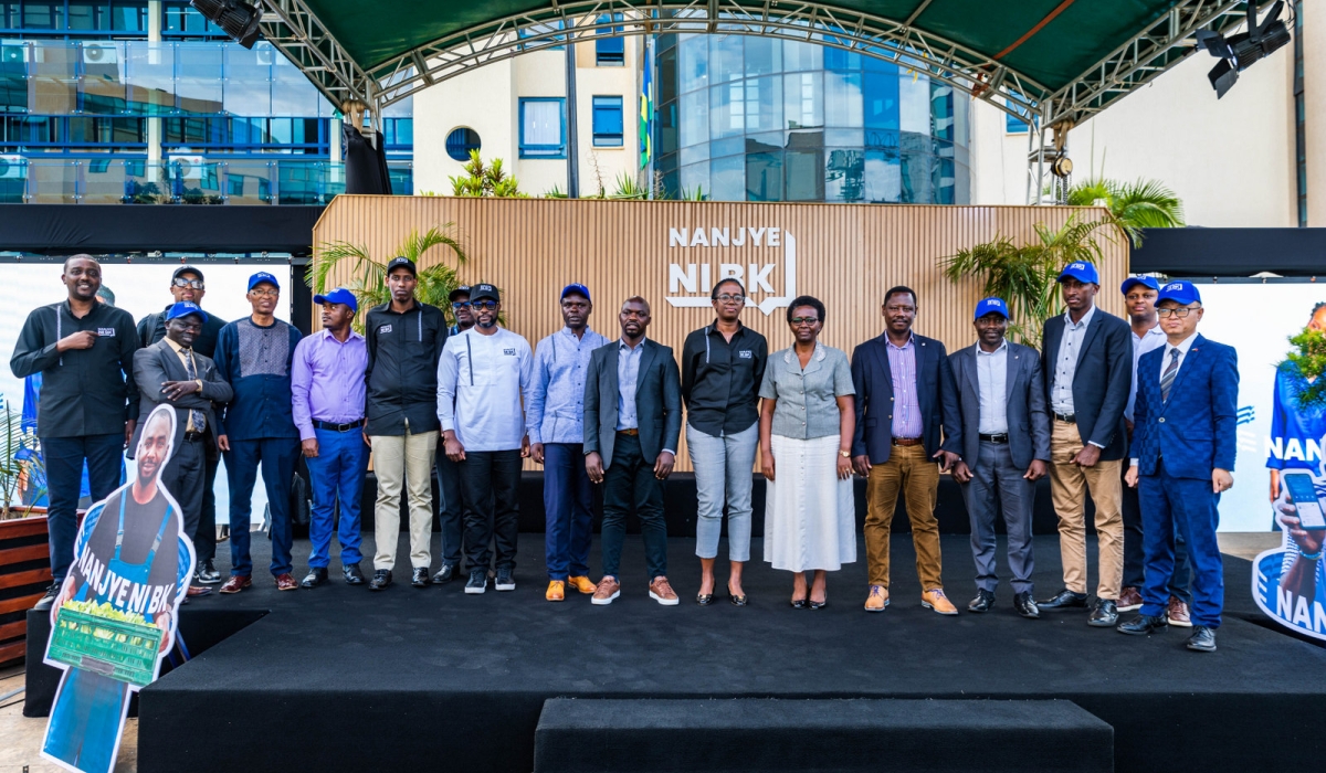 BK staff members pose for a group photo at the launch. The initiative aims to offer tailored products for business, agriculture, and infrastructure sectors, with continuous improvements to streamline savings and loan processes. PHOTOS BY CRAISH BAHIZI