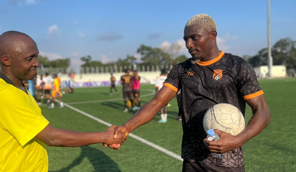 Nigerian striker Ani Elijah takes the match ball after bagging a hat trick against Gasogi United during a Primus National League match on February 11. The leading top scorer is among foreign players who had an outstanding season in Rwanda so far-courtesy