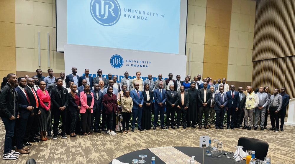 Participants pose for a group photo at the closure of UR’s CEOs and heads of organisations dinner meeting, on March 28, 2024, in Kigali (Emmanuel Ntirenganya)
