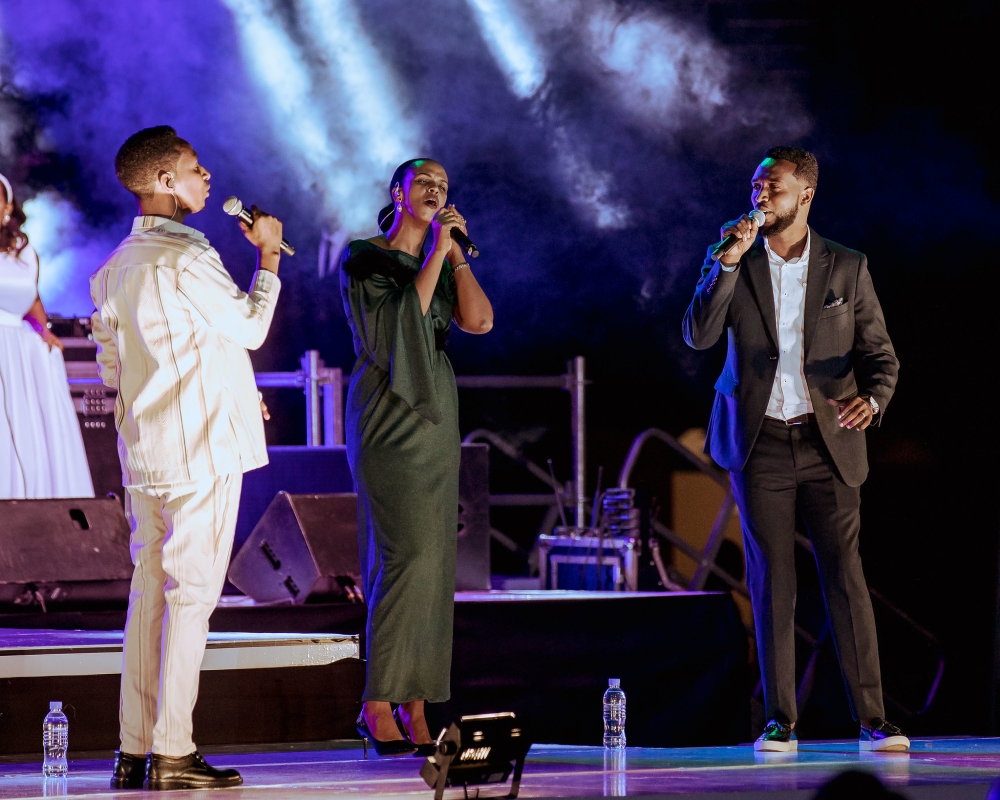 Gospel artistes, Israel Mbonyi, James and Daniella during a joint performance at Icyambu Concert first edition. The three worshippers are expected to perform on Sunday, March 31, during Ewangelia Easter Celebration Concert, at BK Arena to support the creation and development of Kinyarwanda Bibles. Photo by Dan Gatsinzi