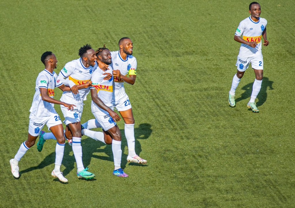 The Blues players join Eric Ngendahimana to celebrate the lone goal as Rayon Sports beat Mukura 1-0 at  Huye stadium on Saturday, March 30. Courtesy