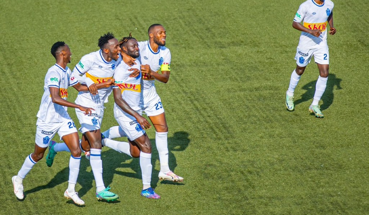 The Blues players join Eric Ngendahimana to celebrate the lone goal as Rayon Sports beat Mukura 1-0 at  Huye stadium on Saturday, March 30. Courtesy