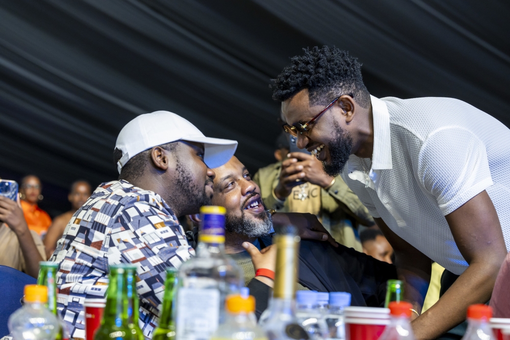 Tuma Basa interacts with some music lovers who turned up for the show