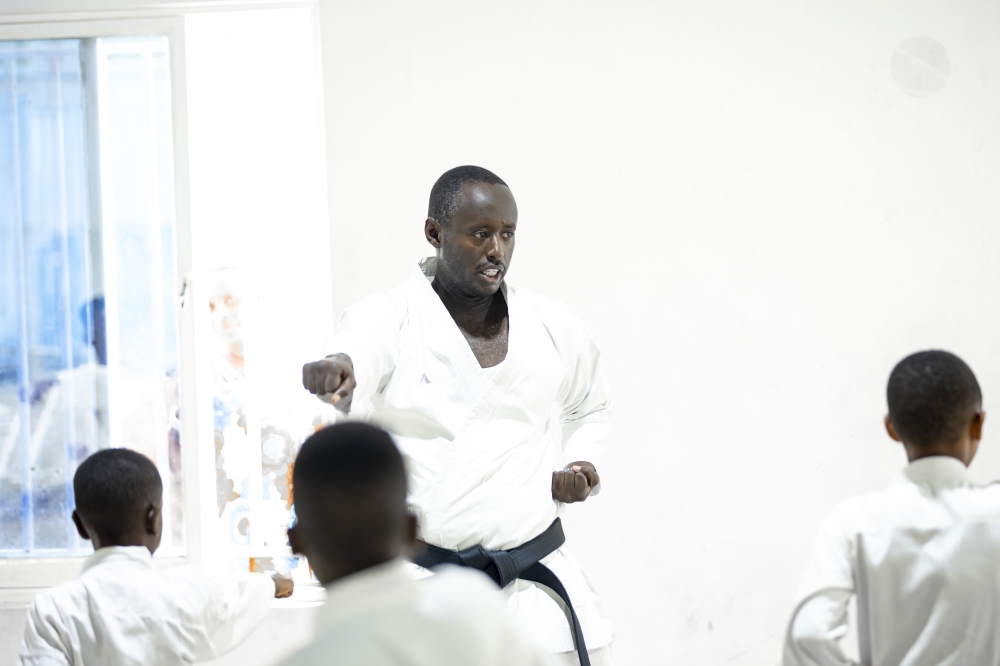 Karate coach, Guy Didier Rurangayire, gives instructions to his trainees during the session.Courtesy