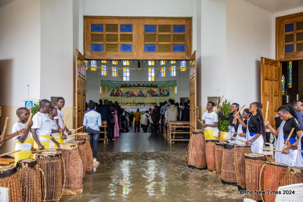 Christians during the mass at REGINA PACIS catholic church in Kigali on Sunday, March 31. Photo by Emmanuel Dushimimana