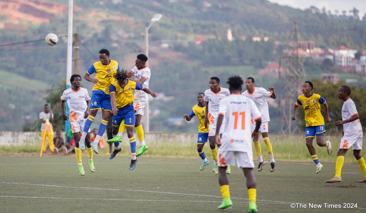 Vision FC and AS Muhanga players vie for the balll during a 1-0 second league tie at Mumena Stadium on Saturday, March 30. All Photos by Craish Bahizi