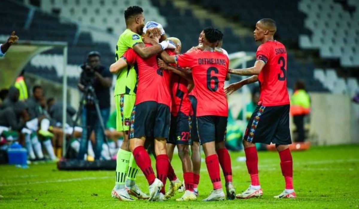 TS Galaxy players mob Goalkeeper Fiacre Ntwari following his great display in their 2-0 win over Amazulu.