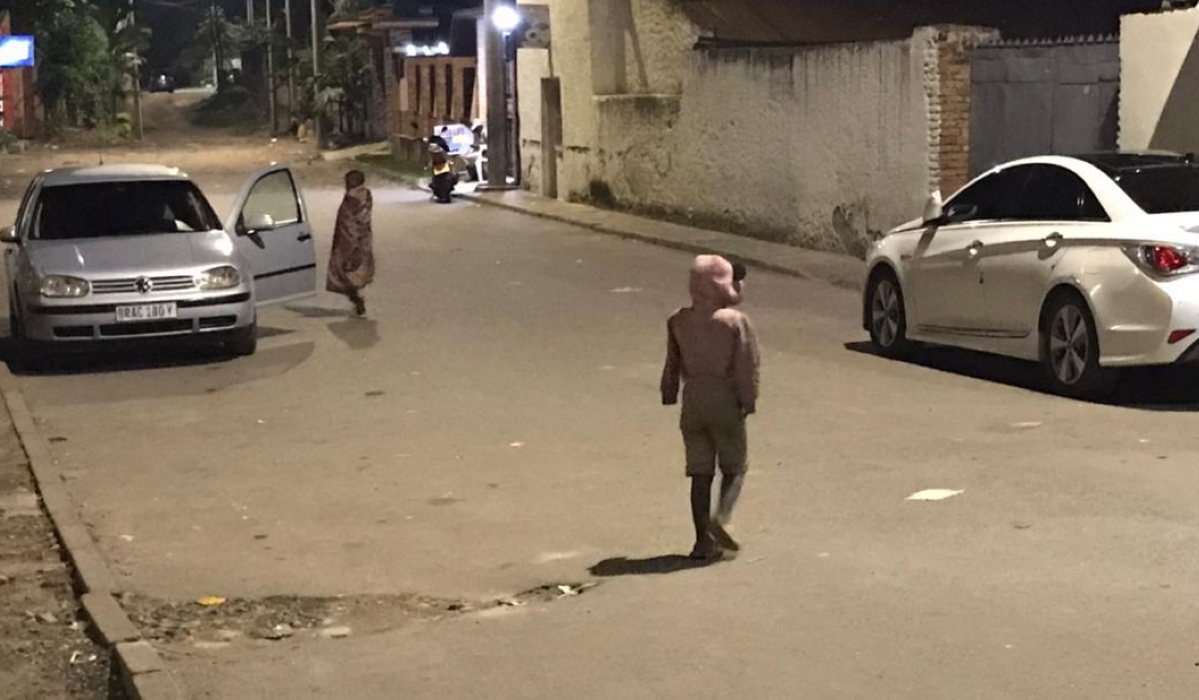 School-age children in Rubavu town spotted begging from cars at night. Photo by Germain Nsanzimana