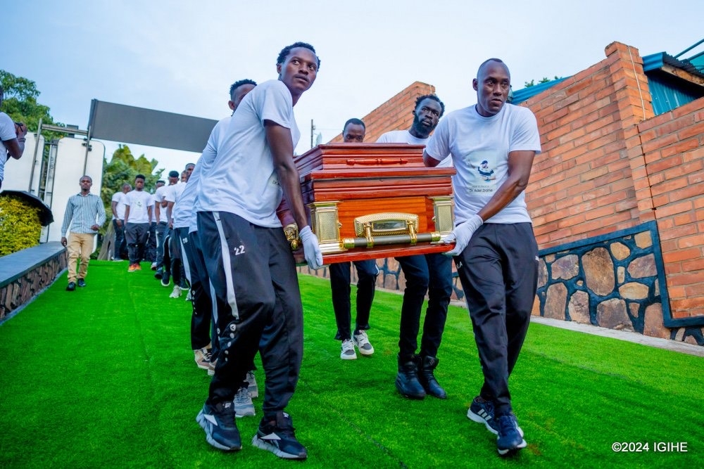 APR FC players carry the body of Late Zrane during the event to bid farewell on Friday, April 5