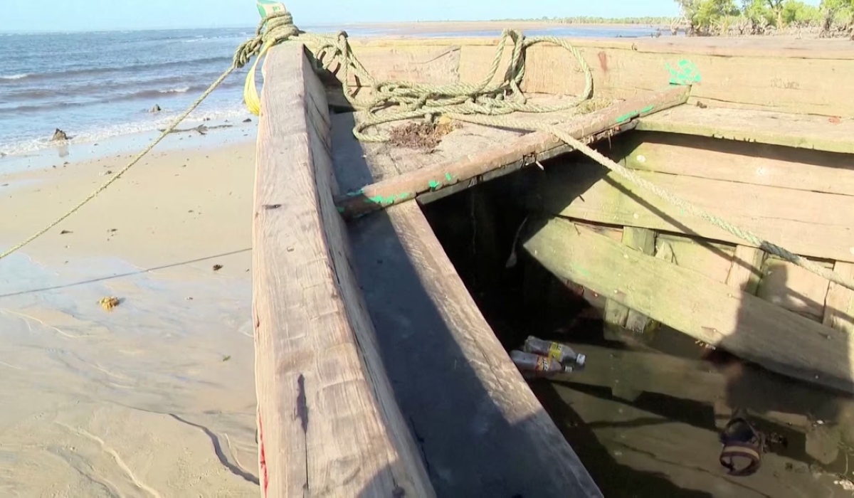 A ferry sits on the shore, which according to an official was unlicensed, following an accident in Nampula Province, Mozambique, in this screen grab obtained from a video on April 8, 2024. PHOTO _ REUTERS
