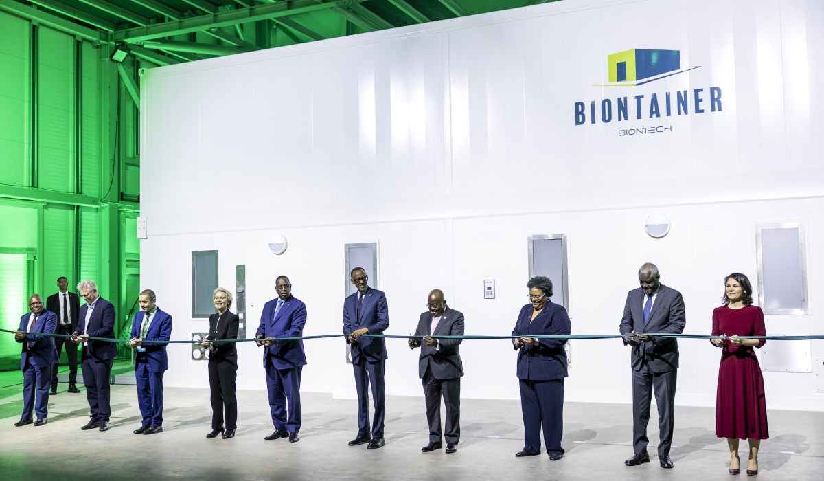 President Paul Kagame, with several heads of state and government, and other senior delegates including BioNTech founder and CEO Ugur Sahin (3rd-L) offically launch BioNTech’s mRNA vaccine manufacturing plant in Kigali on December 18, 2023. 