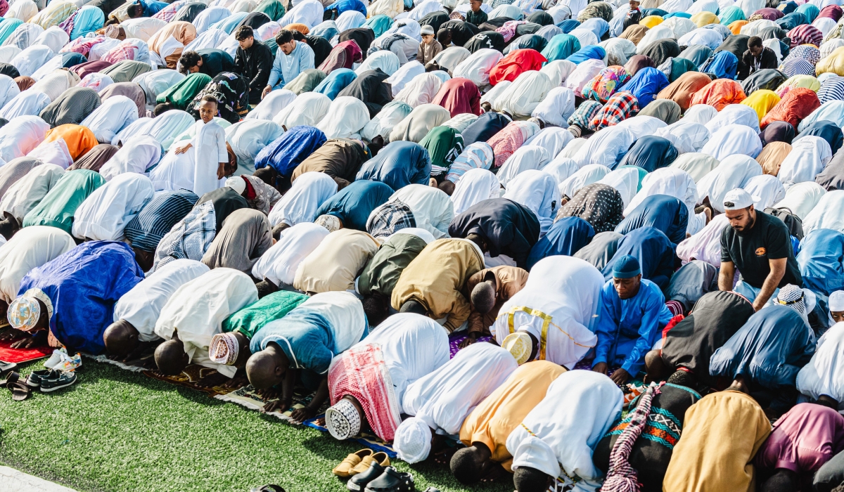 Thousands of Muslims gathered at Kigali Pele Stadium as early as 6:30 for Eid prayers. PHOTOS BY WILLY MUCYO
