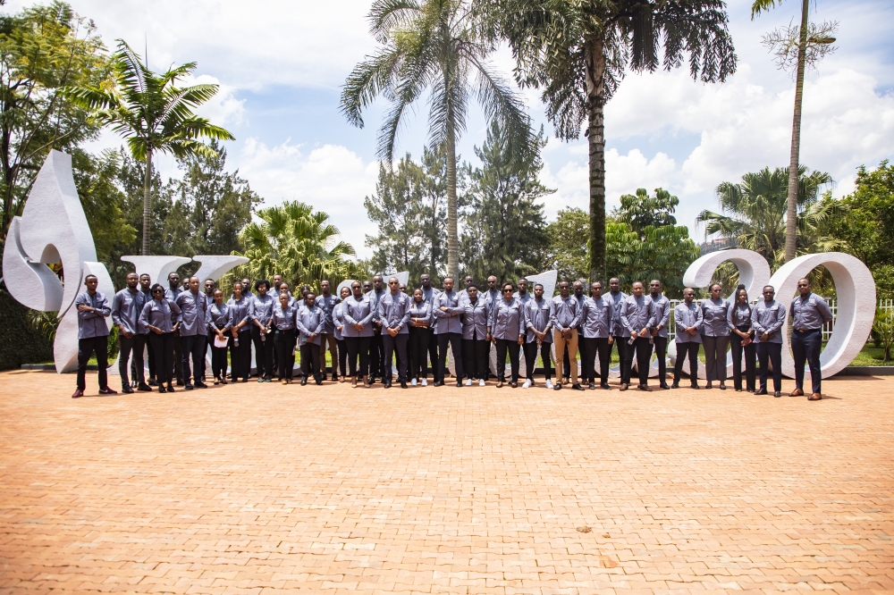 Staff members pose for a group photo after the tour. All Photos by Emmanuel Dushimimana