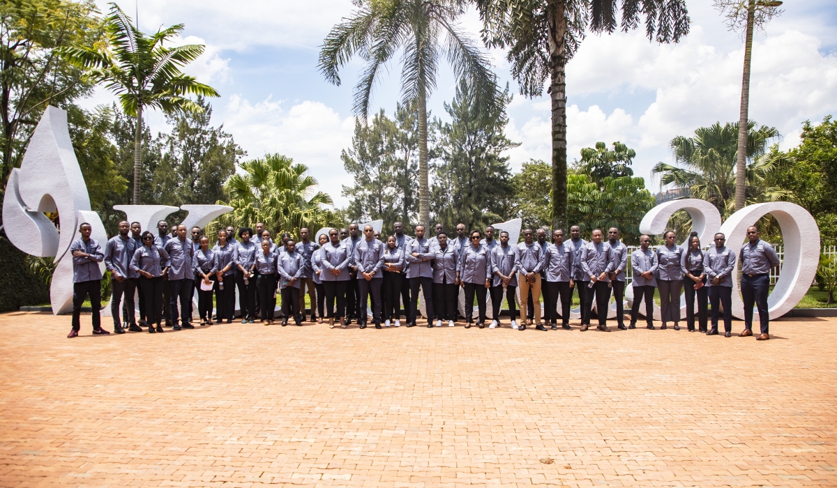 Staff members pose for a group photo after the tour. All Photos by Emmanuel Dushimimana