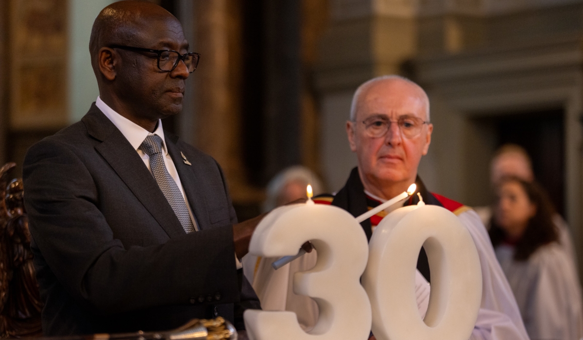Rwanda’s High Commissioner to the UK, Johnston Busingye, lights a candle in remembrance of the innocent lives lost during the 1994 Genocide against the Tutsi.
