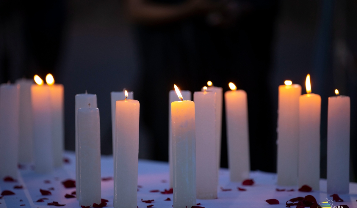Lit candles as members of Rwandan media fraternity commemorated journalists killed in the 1994 Genocide against the Tutsi on Friday, April 12. Photo Courtesy