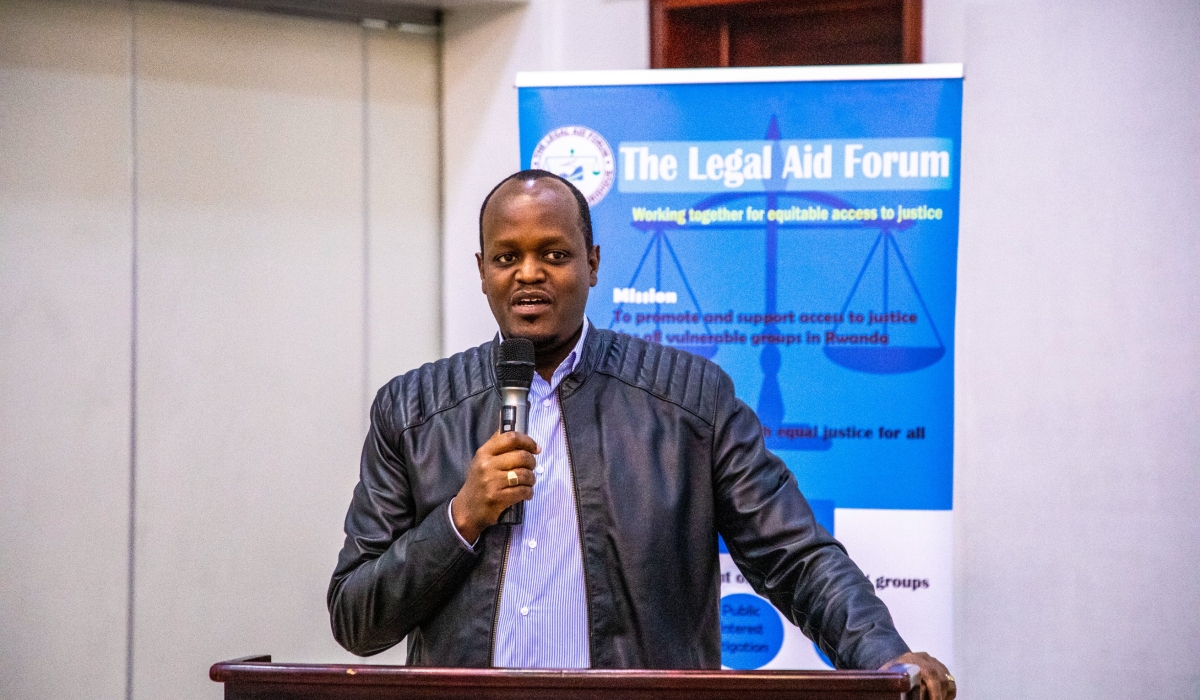 The President of Rwanda Bar Association, Moïse Nkundabarashi, speaks during the Legal Aid Forum discussion on the new family bill on April 12. Courtesy