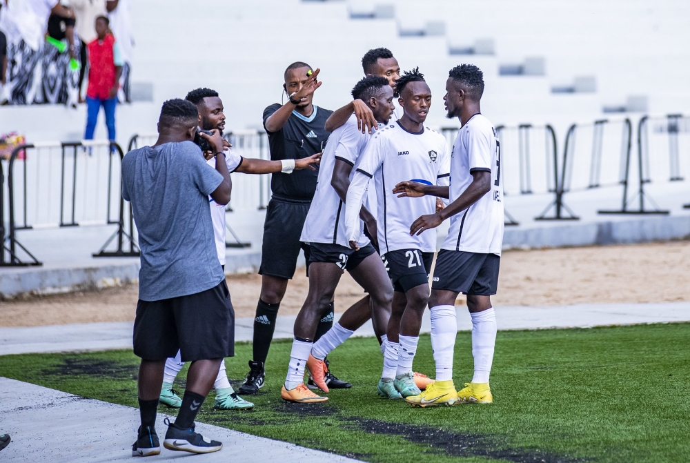 APR FC players celebrate the gaol for equalizer during  a 2-2 draw by 10-man AS Kigali at Kigali Pele Stadium on Monday April 15. Photo by Emmanuel Dushimimana