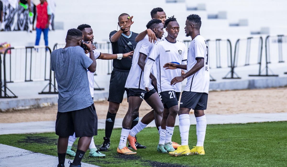 APR FC players celebrate the gaol for equalizer during  a 2-2 draw by 10-man AS Kigali at Kigali Pele Stadium on Monday April 15. Photo by Emmanuel Dushimimana