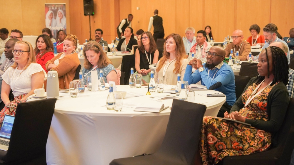 Delegates follow a presentation during the World Vision Sponsorship Summit,  to address realities and chart a course for the future of sponsorship in Kigali.Photos by Craish Bahizi
