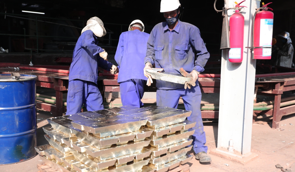 Workers arrange the processed tin at LuNa Smelter, the sole producer and exporter of tin in both Eastern and Central Africa. Sam Ngendahimana