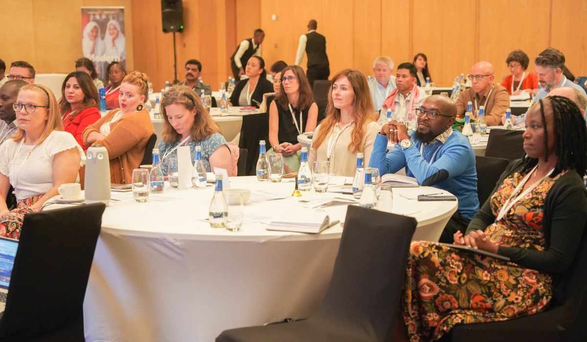 Delegates follow a presentation during the World Vision Sponsorship Summit,  to address realities and chart a course for the future of sponsorship in Kigali.Photos by Craish Bahizi
