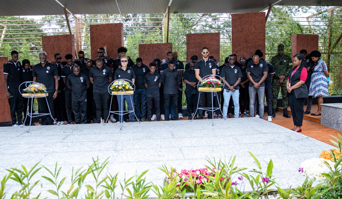 APR Basketball Club players, coaches and staff observe a moment of silence to pay tribute to victims at  Kigali Genocide Memorial Centre  on Thursday, April 18. Photos by Dan Gatsinzi