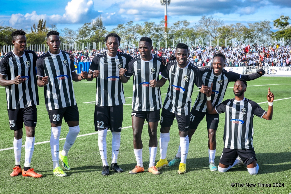 APR FC winger Fitina Omborenga(1st Left) with teammates celebrate the lone goal as they won the 2023-204 Primus National League title. Photos by Craish Bahizi