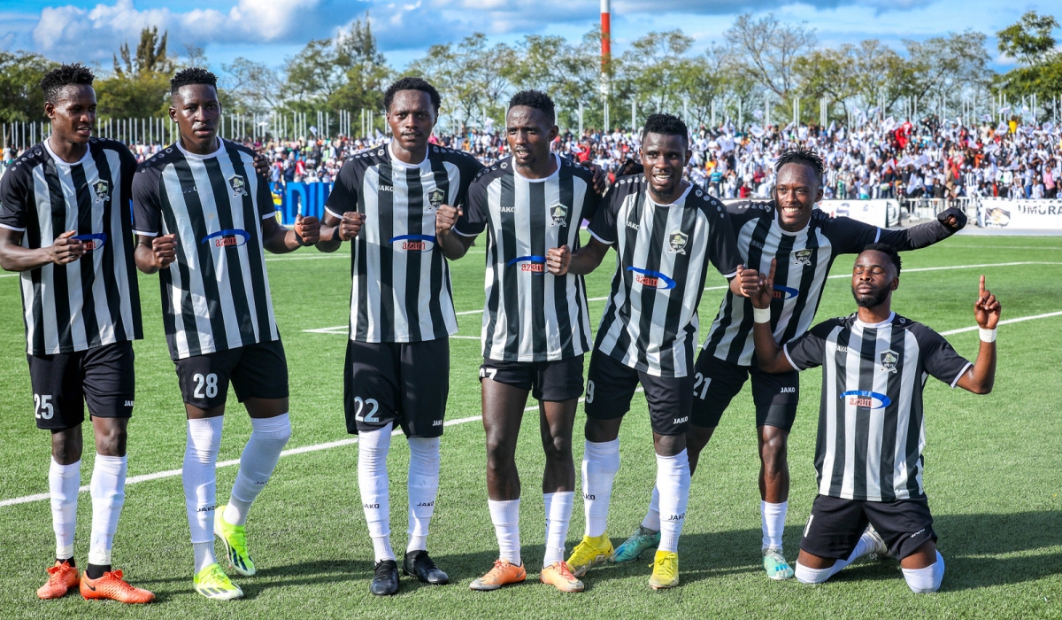 APR FC winger Fitina Omborenga(1st Left) with teammates celebrate the lone goal as they won the 2023-204 Primus National League title. Photos by Craish Bahizi