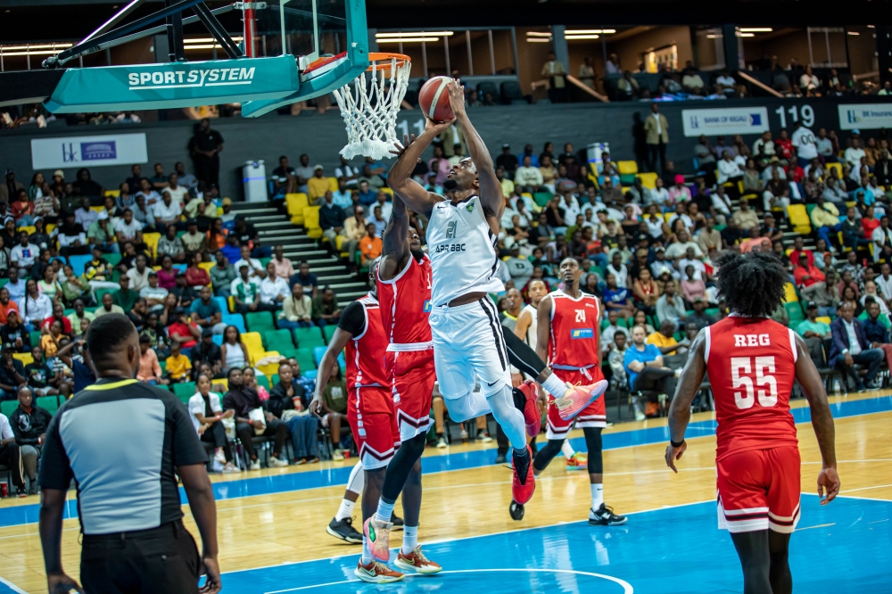 APR BBC player tries a stylish finish during the Genocide Memorial tournament. The inaugural edition of the ground-breaking Rwanda Basketball Cup is scheduled from April 26 to August 9.Dan Gatsinzi
