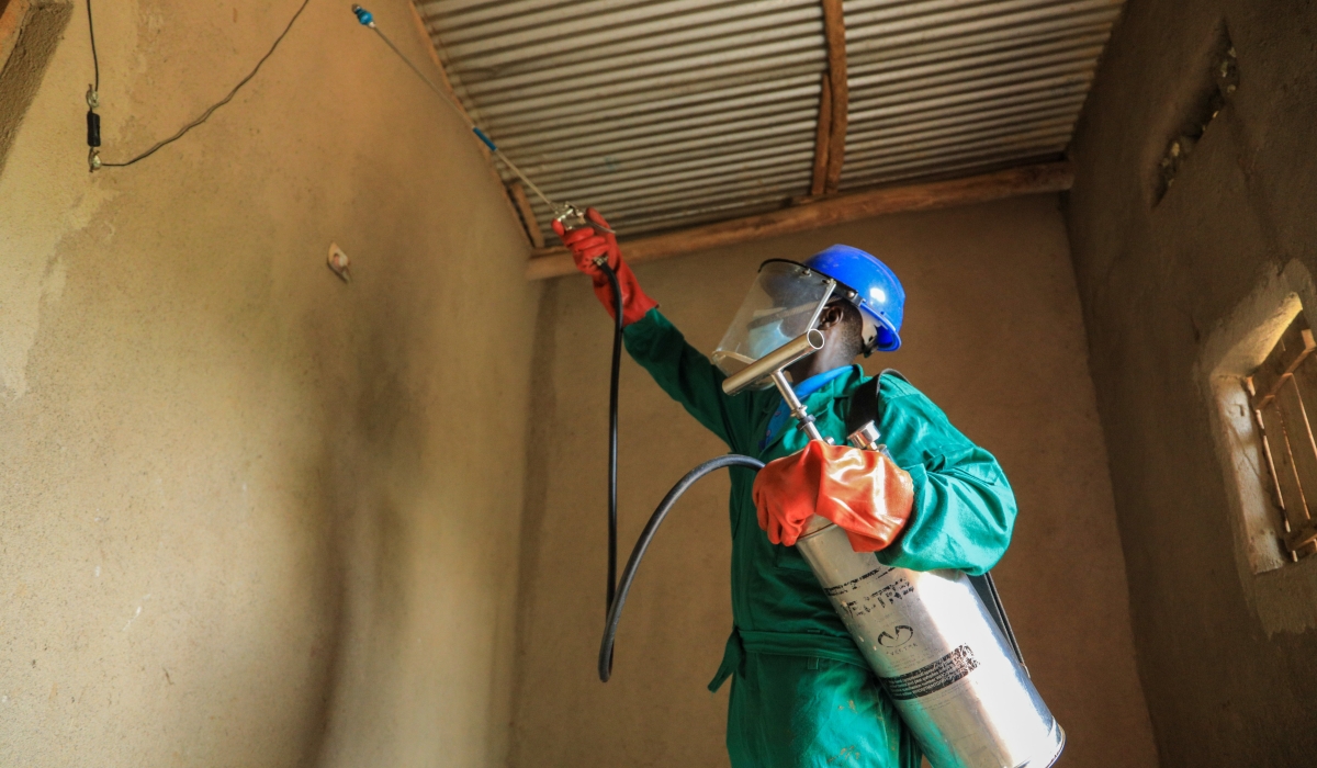 A health worker carries out indoor residual spraying in Bugesera District. According to Rwanda Biomedical Center (RBC), Malaria cases in the country dropped by 88 per cent as of 2023. Photo: File.