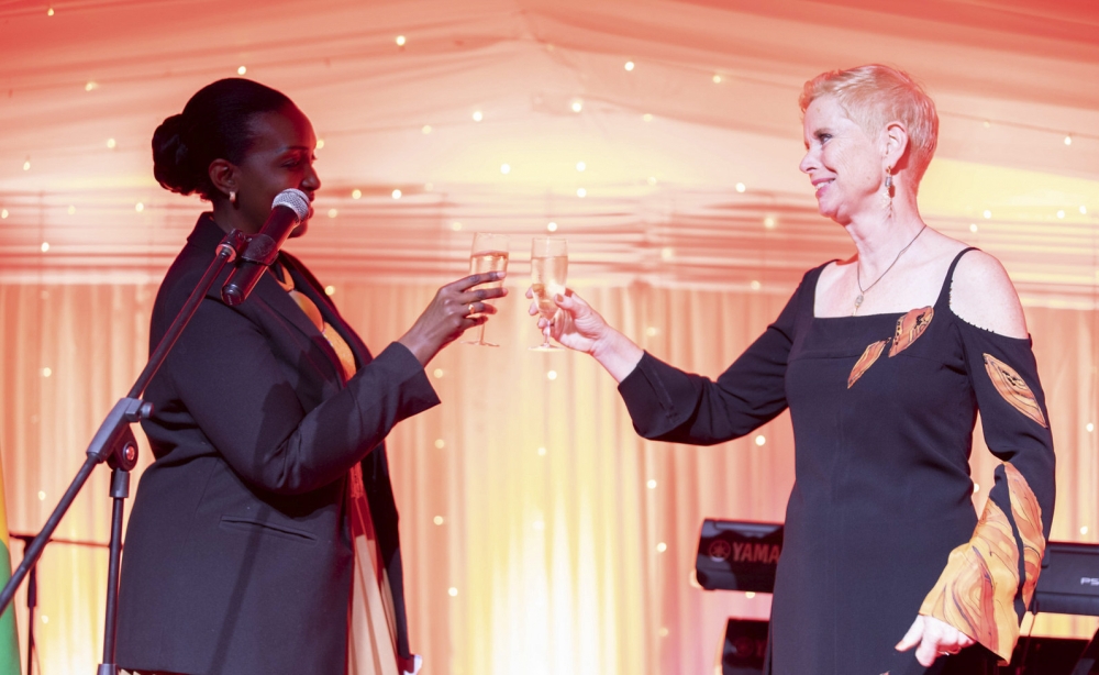 Director General in charge of Europe, Americas & International Organisations, Marie Grâce Nyinawumuntu and Joan Wiegman, the Dutch Ambassador to Rwanda, toast during the King&#039;s Day ceremony in Kigali on Thursday, April 25. All Photos by Craish Bahizi