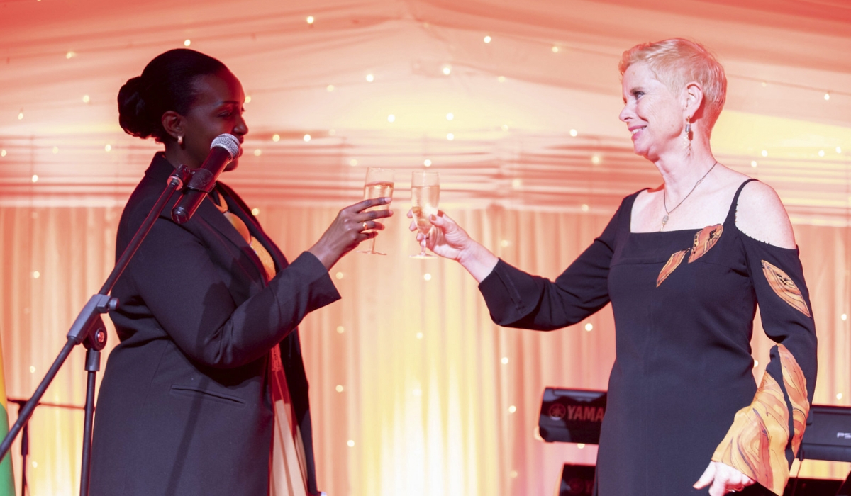 Director General in charge of Europe, Americas & International Organisations, Marie Grâce Nyinawumuntu and Joan Wiegman, the Dutch Ambassador to Rwanda, toast during the King&#039;s Day ceremony in Kigali on Thursday, April 25. All Photos by Craish Bahizi