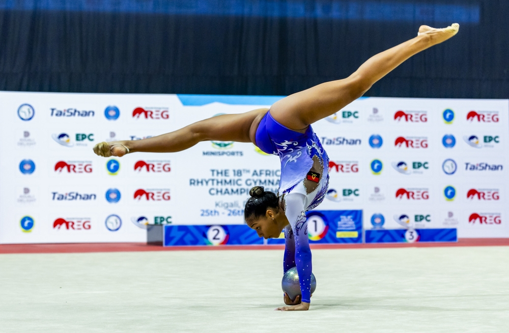 One participants of the 18th Rhythmic Gymnastics championship showcases her skills during the competition in Kigali. Photos by Olivier Mugwiza