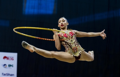 One of the participants of the 18th Rhythmic Gymnastics championship in action during the competition that attracted 13 countries at BK Arena on Thursday, April 25 in Kigali. All photos by Olivier Mugwiza
