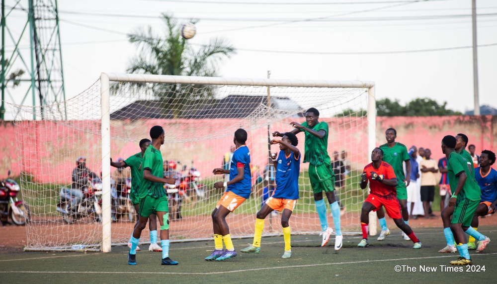 Vision FC and  Interforce FC vie for the ball  during  a goalless draw at Mumena Stadium on Saturday, April 27. Photos by Craish Bahizi