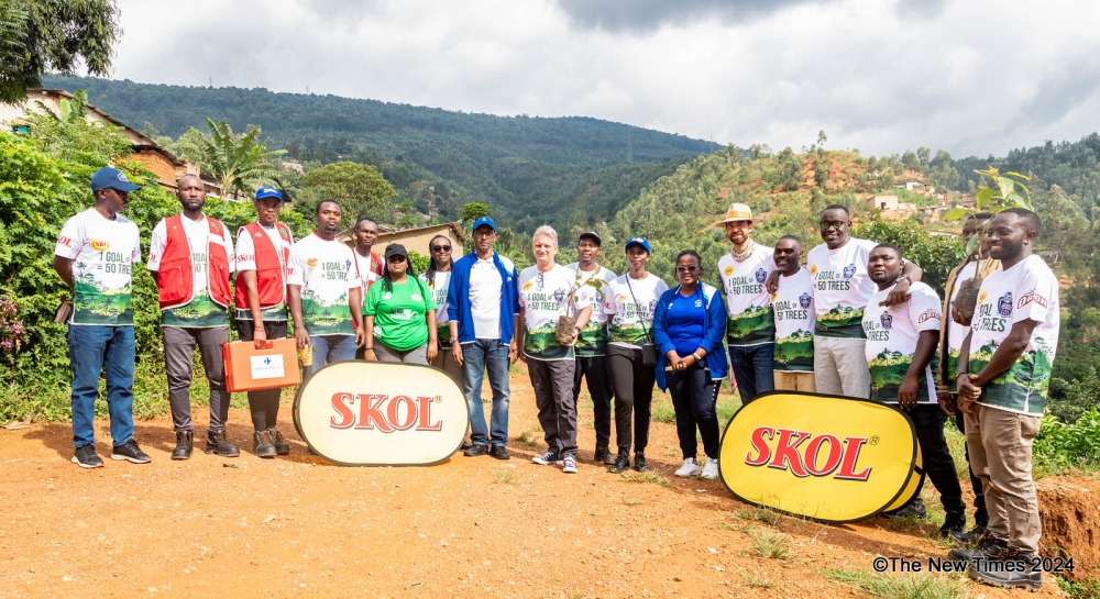 Partners pose for a group photo. This partnership will see 6,000 trees planted in Kigali throughout 2024. All Photos by Craish Bahizi