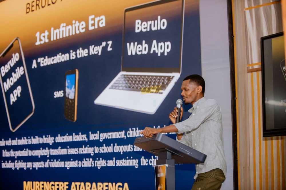 Ian Berulo Cyusa speaks during the launch of the Berulo mobile app which he designed to help bridge the gap between educators, local government authorities, as well as students and their families. All photos: Courtesy.
