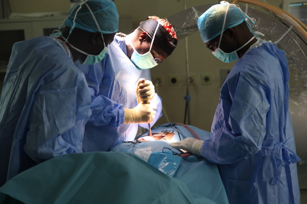 Doctors during an operation at King Faisal Hospital. Sam Ngendahimana