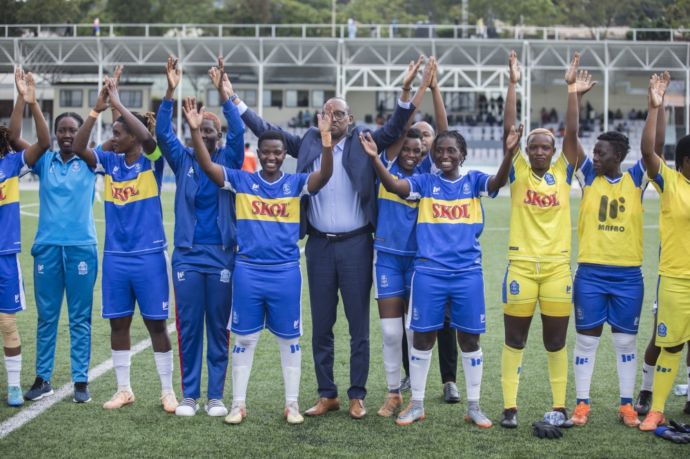 Rayon Sports WFC players and Team President celebrate the 4-0 win over  Indahangarwa WFC to win their first ever women’s Peace Cup trophy at Kigali Pele Stadium on Tuesday, April 30. Photos by Craish Bahizi.