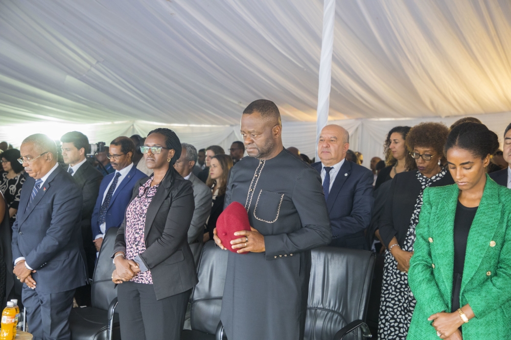 The United Nations in Rwanda employees and other mourners observe a moment of silence to pay tribute to 68 former staff members who were killed during the 1994 Genocide against the Tutsi, in Kigali on Tuesday, April 30, 2024. All photos by  Craish Bahizi