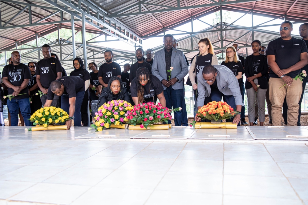Officials of Vivendi Group’s subsidiaries in Rwanda lay wreaths to pay tribute to victims of the 1994 Genocide against the Tutsi at Nyanza Genocide Memorial in Kicukiro on Tuesday, April, 30. All photos: Craish Bahizi.