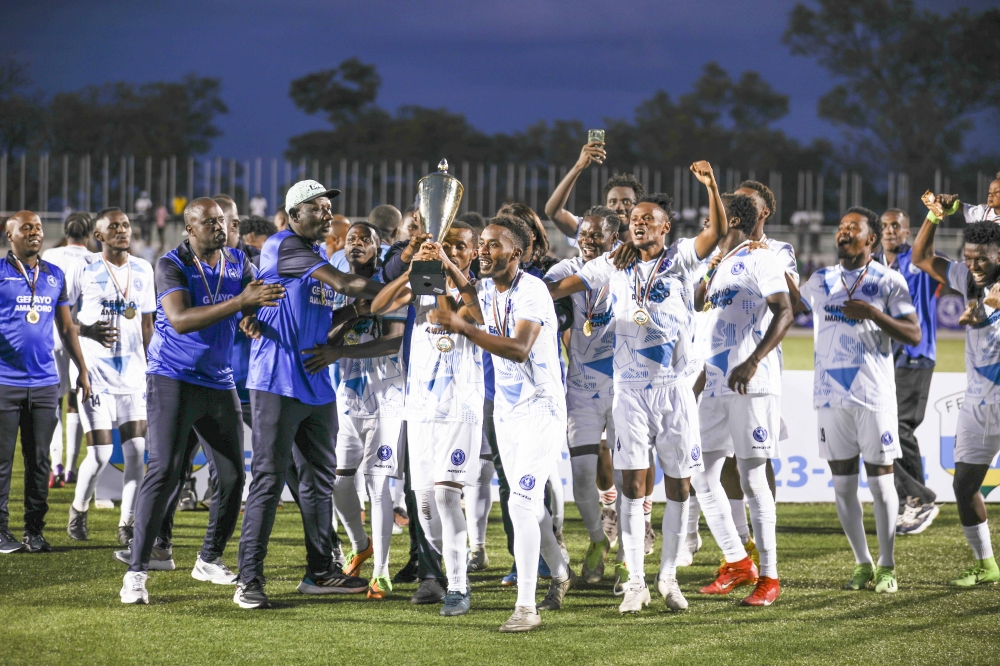 Players with the trophy after beating Bugesera 2-1 to win Peace Cup title.